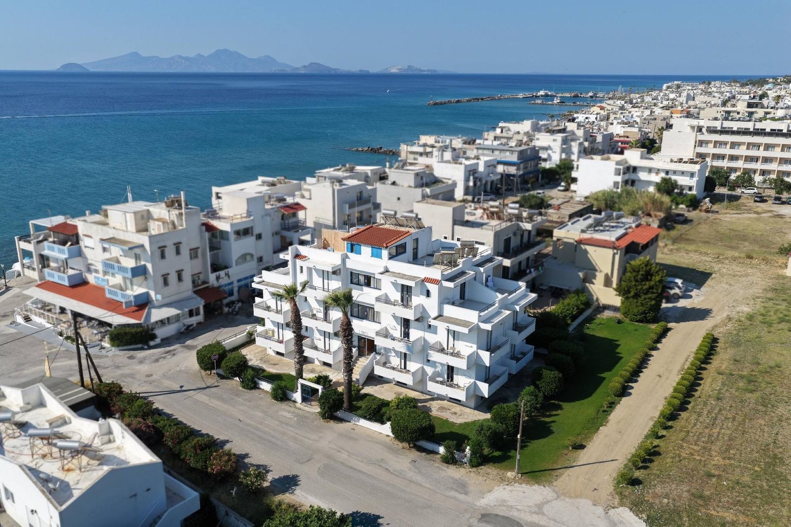 Aerial view of Philippos Studios & Apartments on the beachfront of Kardamena, Kos